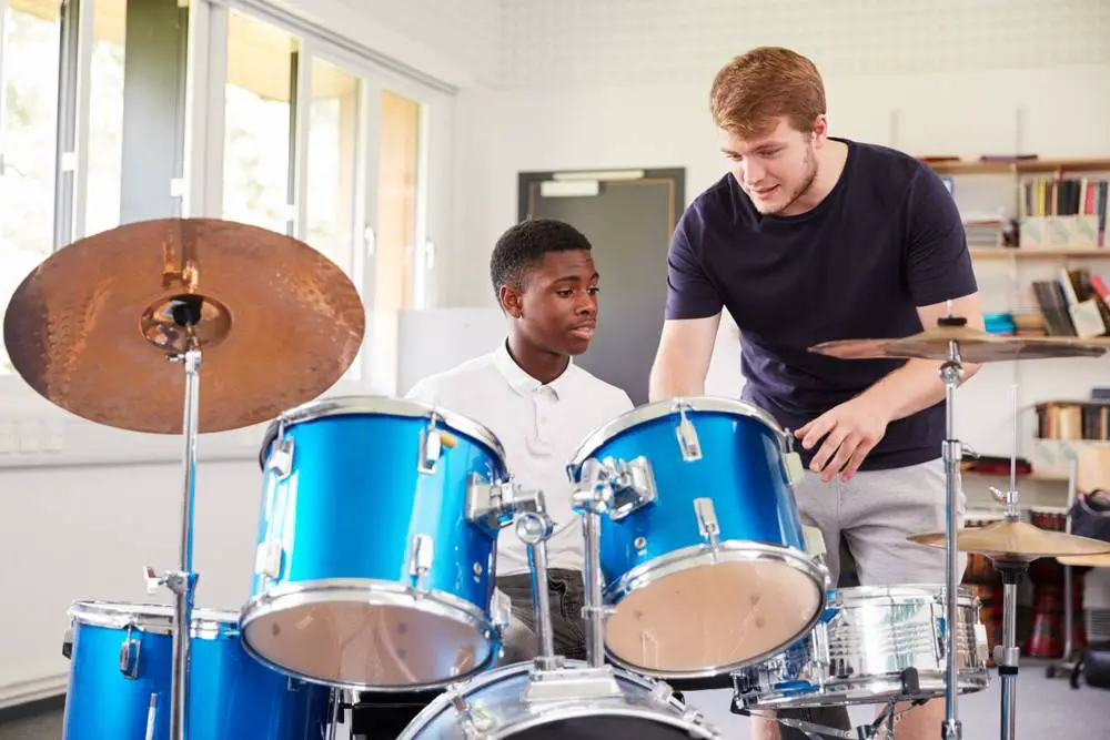 learn to play drums for beginners-teacher and student